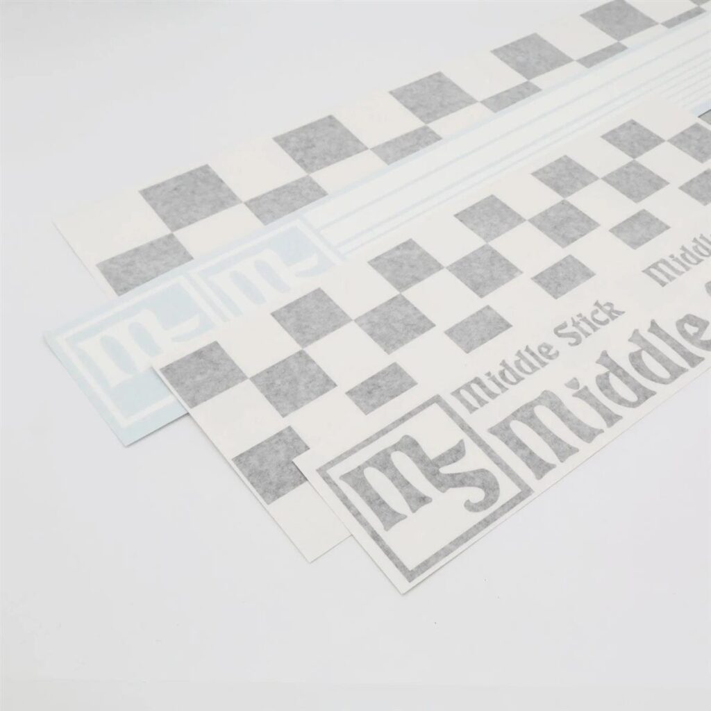 DEKALER FOR MIDDLE STICK