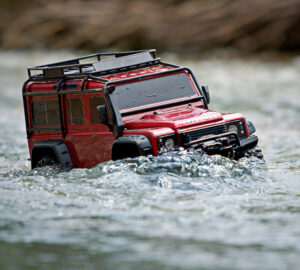 LAND ROVER DEFENDER SCALE & TRAIL 4WD RØD- TRAXXAS (TRX82256-4-RED)